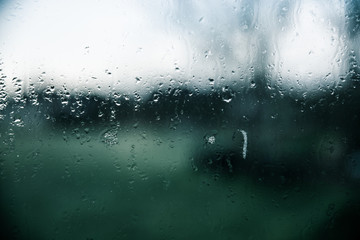rain water drops on glass window pane background