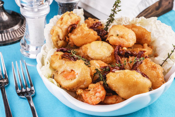 Mediterranean dish, salmon meat fried in butter served in rosemary dough