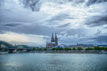 Cologne Cathedral Rhine river cloudy sky