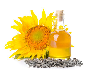 Composition with sunflower oil on white background