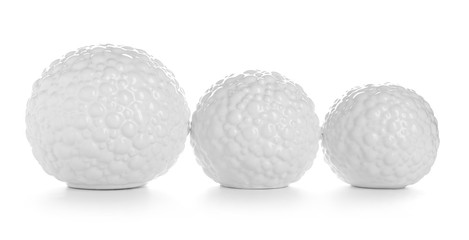 Decorative ceramic balls on white background