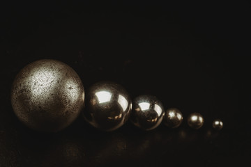 Metal spheres on a black background