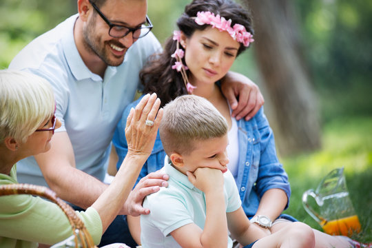 Family Consoling Little Stubborn Child And Managing Emotions