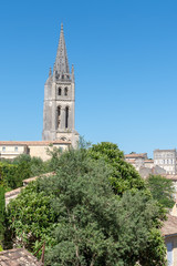 Fototapeta na wymiar view of French village Saint Emilion dominated by spire of the monolithic church France