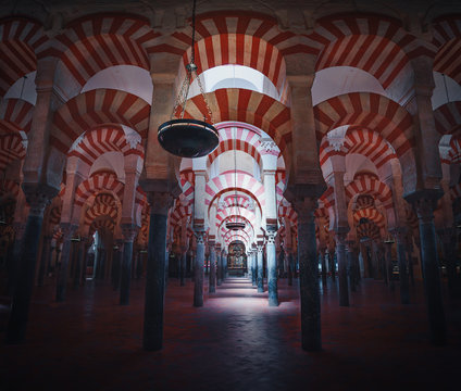 Interior of Cordoba Mosque Cathedral with its beautiful white and red arches - Cordoba, Andalusia, Spain