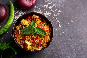 vegetarian paneer biryani at black background. paneer biryani is traditional veg indian cuisine...