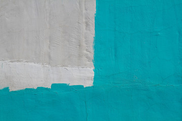 Colorful (gray and turquoise ) concrete wall as background, texture
