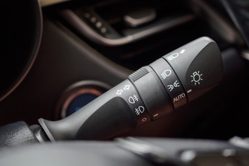 Car light control switch close up