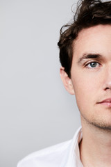 Fototapeta premium Portrait of blue eyed man, studio