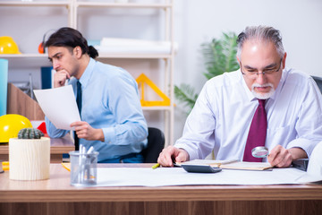 Two architects working on the project