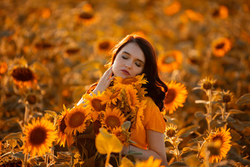 girl in a field of sunflowers