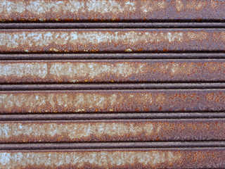 Old metal rusty door textured background
