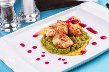  Mediterranean Chicken, on a pillow of pea puree with cranberry sauce