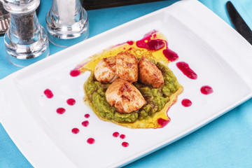  Mediterranean Chicken, on a pillow of pea puree with cranberry sauce