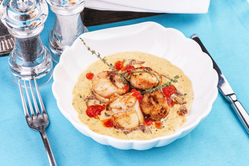 Mediterranean soup with seafood, crab meat, fish and chicken with creamy broth
