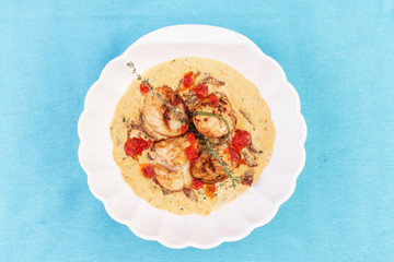 Mediterranean soup with seafood, crab meat, fish and chicken with creamy broth