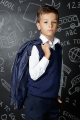 Child fashion school. Teen boy getting ready for school. School uniform. 