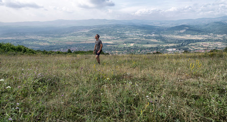 Fototapeta premium Hiker enjoying in the mountain