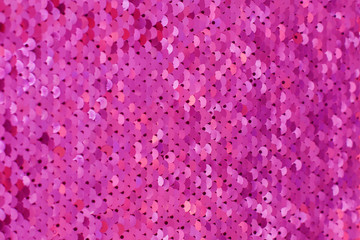 Sequin background. glitter surfactant. Holiday abstract glitter background with blinking lights....