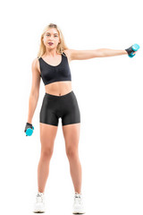 Fototapeta premium Beautiful fit woman exercising with dumbbells