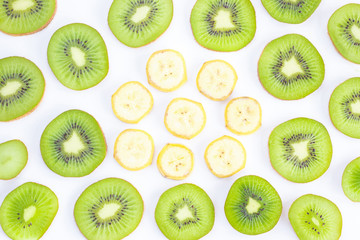Fototapeta premium Sliced kiwi and banana isolated on white background
