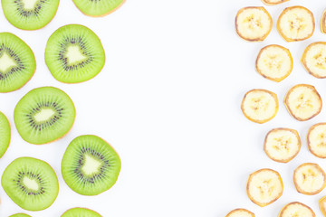 Fototapeta na wymiar Sliced kiwi and banana with copy space isolated on white background