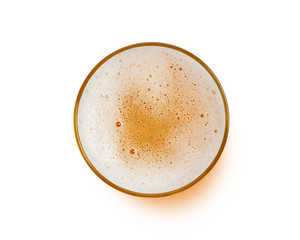 top view of beer bubbles in glass cup on white background. with clipping path.