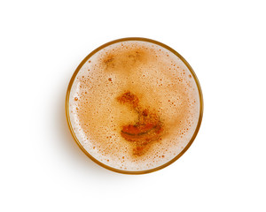 top view of beer bubbles in glass cup on white background. with clipping path.