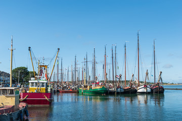 Small harbor with sailing boats and fishing boats. Terschelling, The Netherlands, Europe.