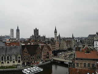 Fototapeta premium Amazing view from above. Small and comfortable town Gent. Medieval history around you.Must see for all explorer. View from Drone. From Belgium with Love. Clock tower.