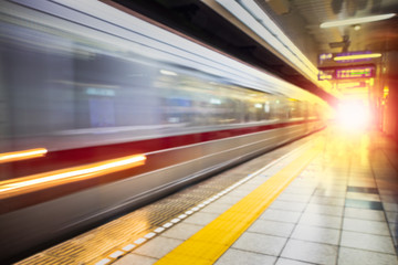 Fototapeta na wymiar Subway station Modern high speed passenger train on railroad in motion