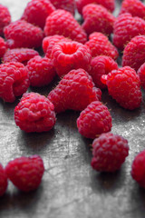 red,delicious raspberries close up