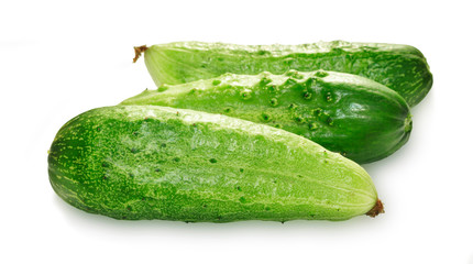 Three green cucumbers