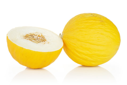 Group of one whole one half of fresh yellow melon canary isolated on white background