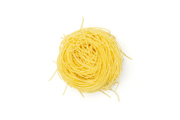 One whole raw pasta angel hair flatlay isolated on white background