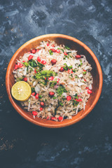 Dapde Pohe is a typical Maharashtrian breakfast, made with thin variety of poha and fresh coconut with chilli, peanuts and nuts. served in a bowl or plate. selective focus