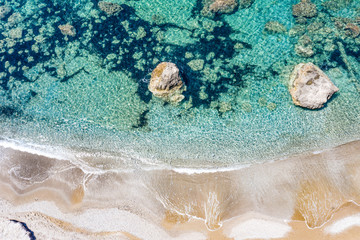 Aerial view of beautiful rocky coastline with turquoise sea water..