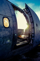Door of plane wreck at abandon field