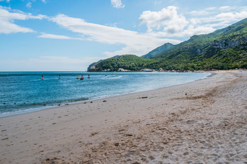 Obraz premium Exotic landscape with mountains of the Serra da Arrábida Natural Park in Creiro beach, Setúbal PORTUGAL