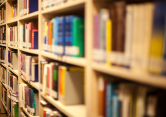 Blurred background. Library, books. Close-up.