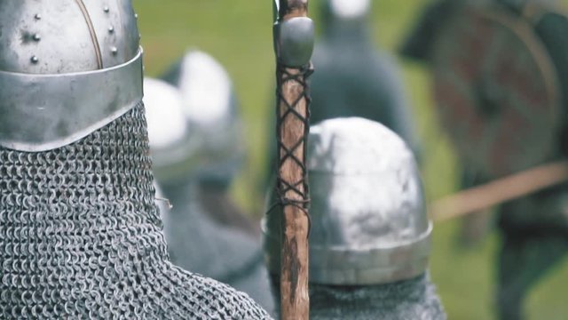 Knight warriors marching forward. Medieval soldiers in full plate armor