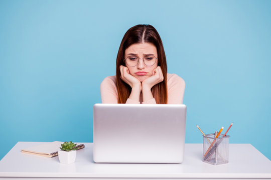 Close up photo beautiful she her lady hands arms lean hold air foxy head sit desk table notebook look screen soap opera tv office workplace wear casual pastel pullover isolated bright blue background