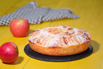 Naklejka na ściany i meble Sweet homemade apple cake with cinnamon.