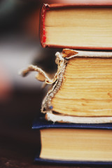  stack of old books on the wooden table