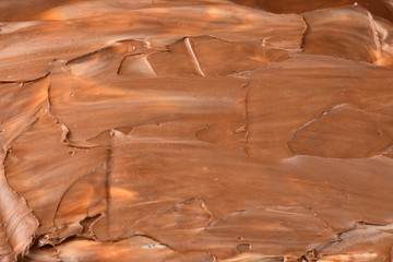 Chocolate cream background. Space for text or design.