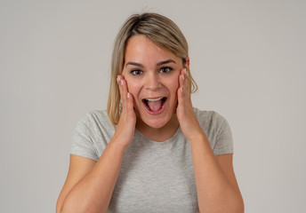 Fototapeta premium Portrait of surprised and happy woman celebrating victory and winning lottery in human emotions