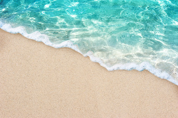 Fototapeta na wymiar Soft blue ocean wave or clear sea on clean sandy beach summer concept