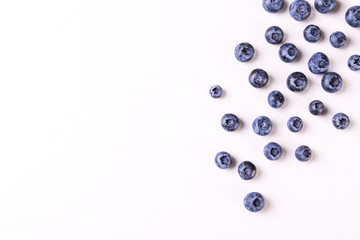 Perfectly ripe freshly picked local produce blueberries. Close up, copy space for text, top view, background. Healthy vegan snacks full of antioxidants. Seasonal summer berries.