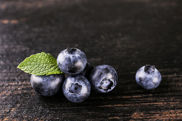 Perfectly ripe freshly picked local produce blueberries. Close up, copy space for text, top view, background. Healthy vegan snacks full of antioxidants. Seasonal summer berries.