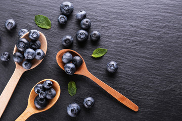 Perfectly ripe freshly picked local produce blueberries. Close up, copy space for text, top view, background. Healthy vegan snacks full of antioxidants. Seasonal summer berries.